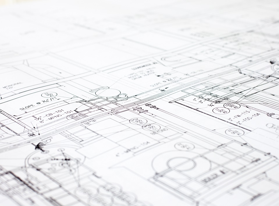 Installer measuring deck boards during installation